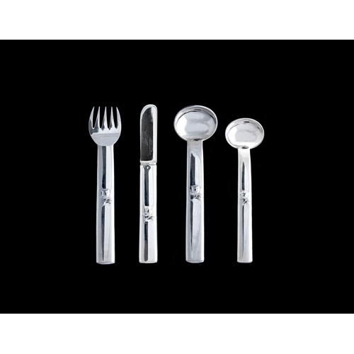 FOUR PIECES OF CUTLERY FOR CHILDREN