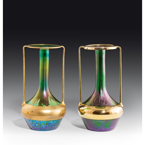 A pair of vases with brass mount