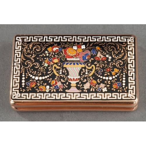 A gold and champlevé enamel snuffbox