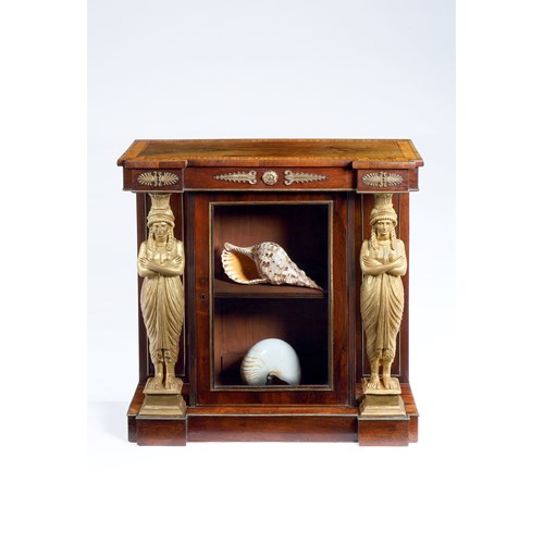 A rare rosewood satinwood and carved giltwood side cabinet