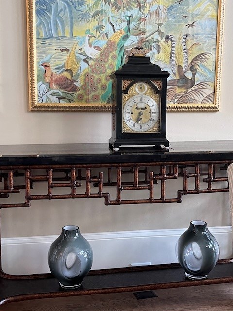 A bracket clock goes well with other antiques and artworks