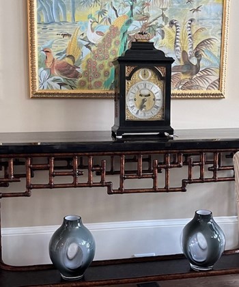 A bracket clock goes well with other antiques and artworks
