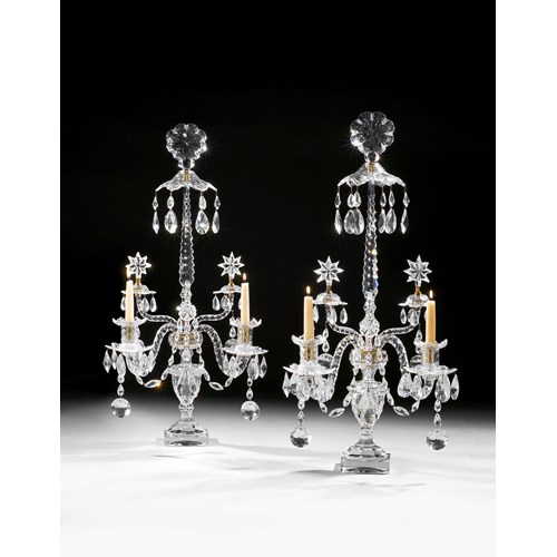 A pair of cut glass two light candelabra