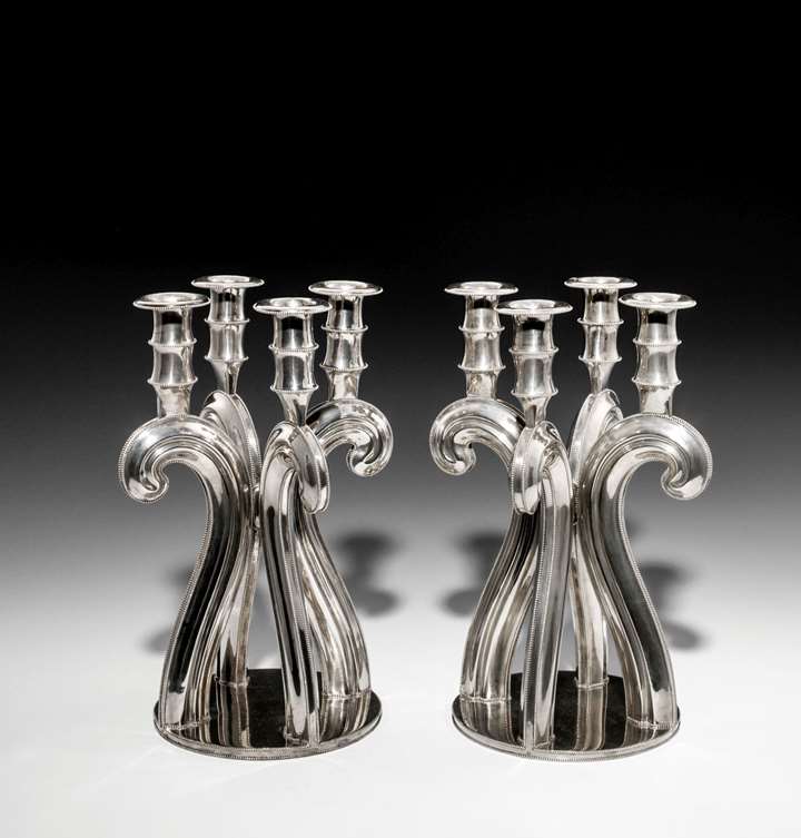 A PAIR OF VIENNESE SILVER GIRANDOLES
