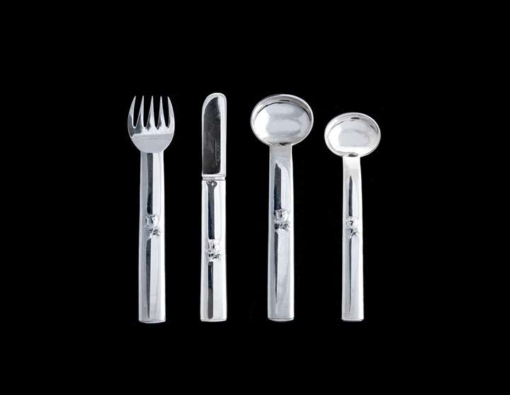 FOUR PIECES OF CUTLERY FOR CHILDREN
