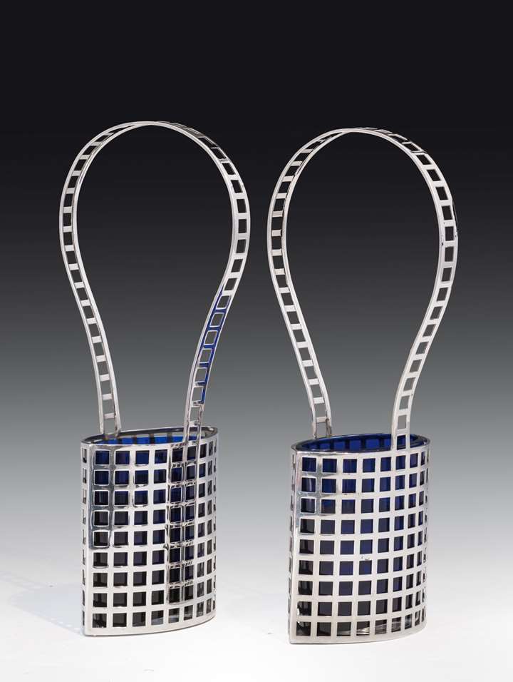 A pair of silver baskets