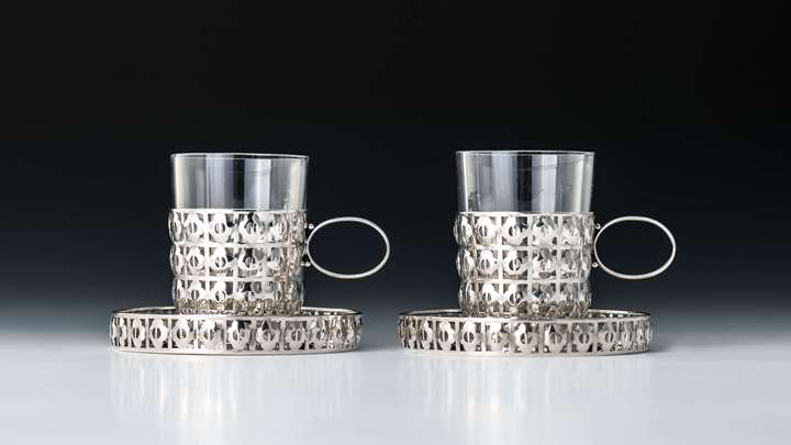 TWO PAIRS OF CUPS AND SAUCERS