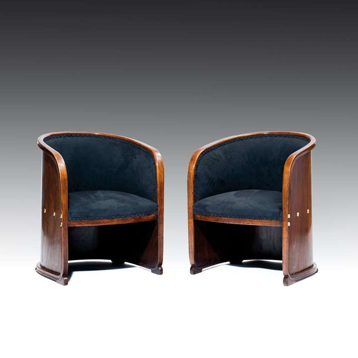 A PAIR OF ARMCHAIRS known as Barrel Chairs