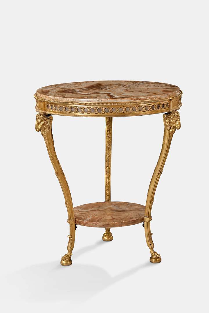 A RUSSIAN ORMOLU AND ARAGONITE TRIPOD GUERIDON WITH SHEEPS HEADS