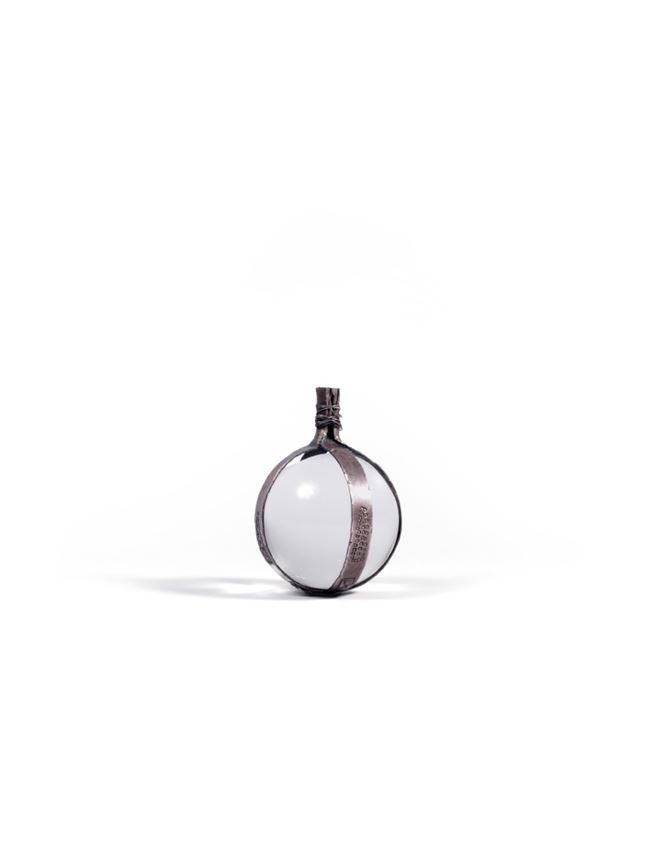 Spherical pendant with a silver crimp made of rings ...