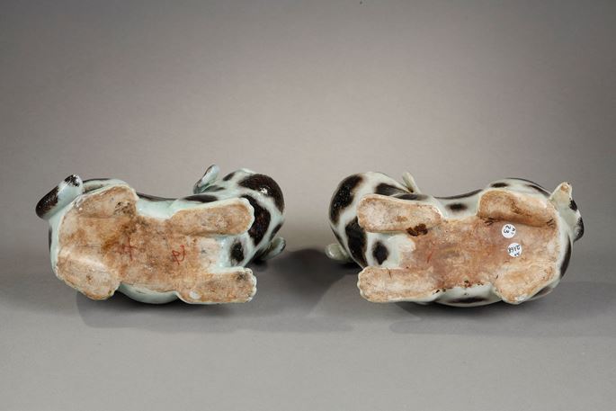 Pair of dogs forming incense stick holders in brown speckled porcelain on beige background | MasterArt