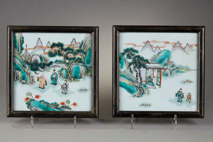 Pair of porcelain quadrangular plaques of the "Famille Verte"  has decorated characters in a landscape