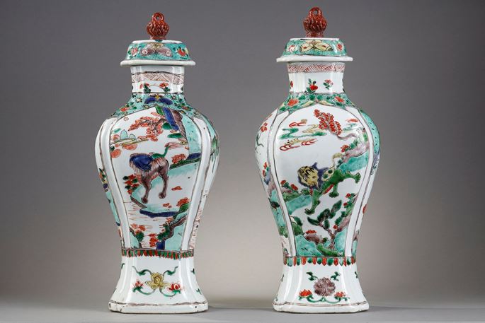 Pair of quadrangular porcelain vases &quot;Famille Verte &quot; decorated with kilins and birds on backgrounds of landscapes and butterflies - China Kangxi period 1662/1722  High 32cm | MasterArt