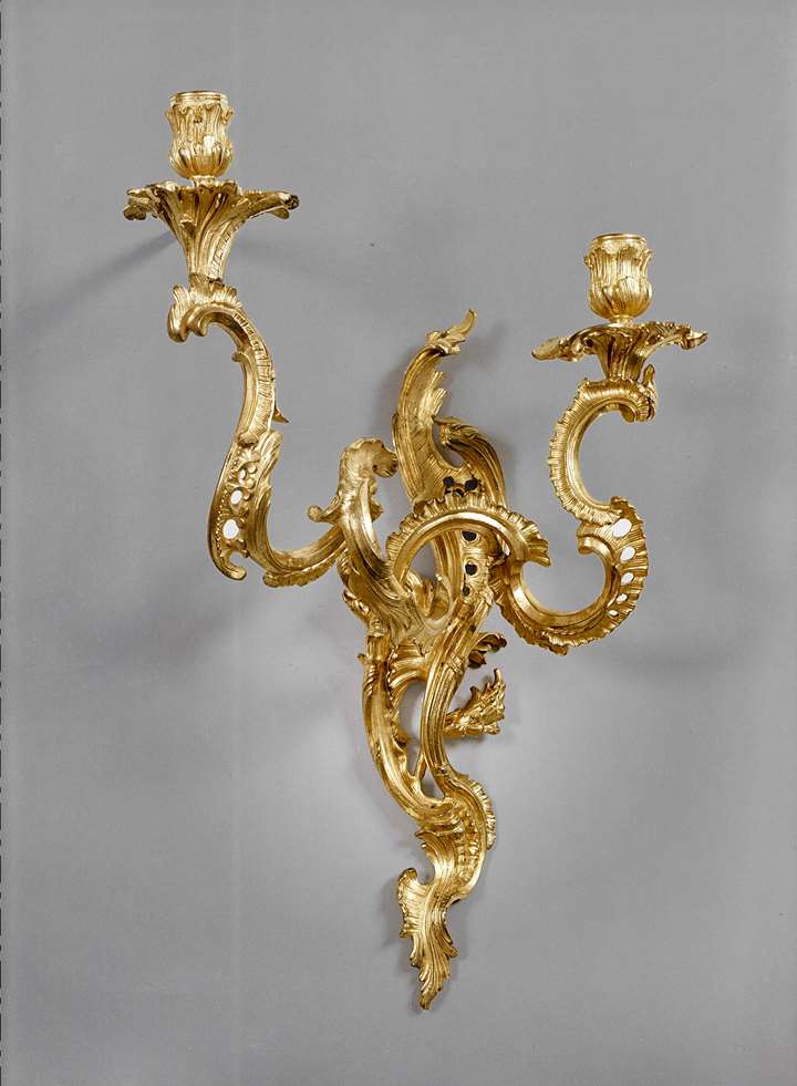 A RARE PAIR OF GILT BRONZE TWO BRANCH WALL LIGHTS