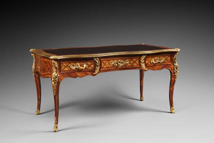 A Louis XV ormolu-mounted satinated wood and Kingwood bureau plat