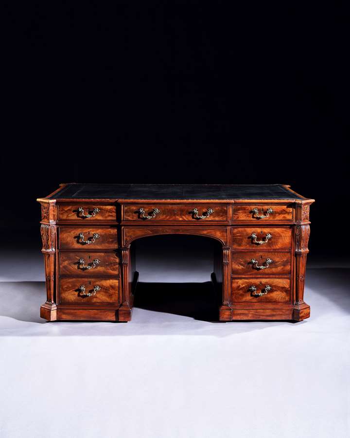 An Important Chippendale Period carved Mahogany Partners Desk