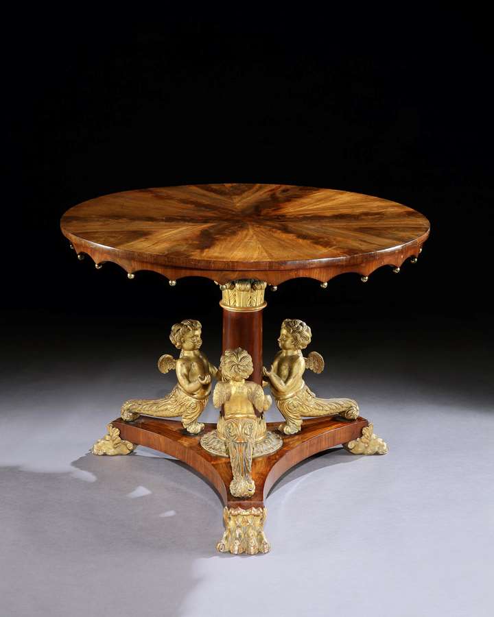 A rare mahogany and carved gilt centre table