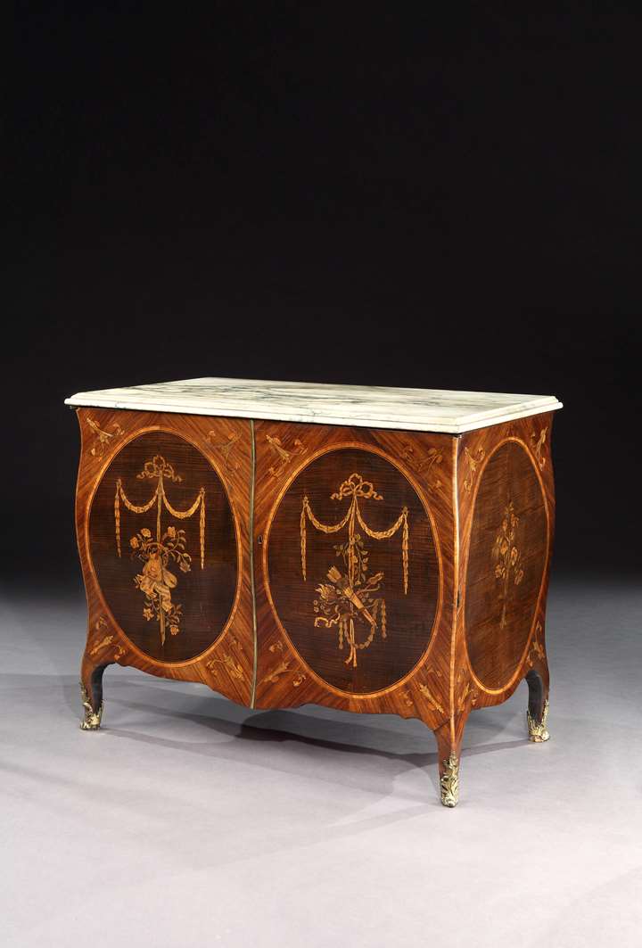An Exceptional Pair of George III Marquetry Bombe Commodes Attributed to Mayhew and Ince