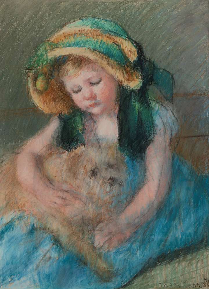 Sara au bonnet avec son chien