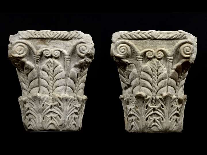 A Pair of pseudo Corinthian Capitals with acanthus foliage and palmettes