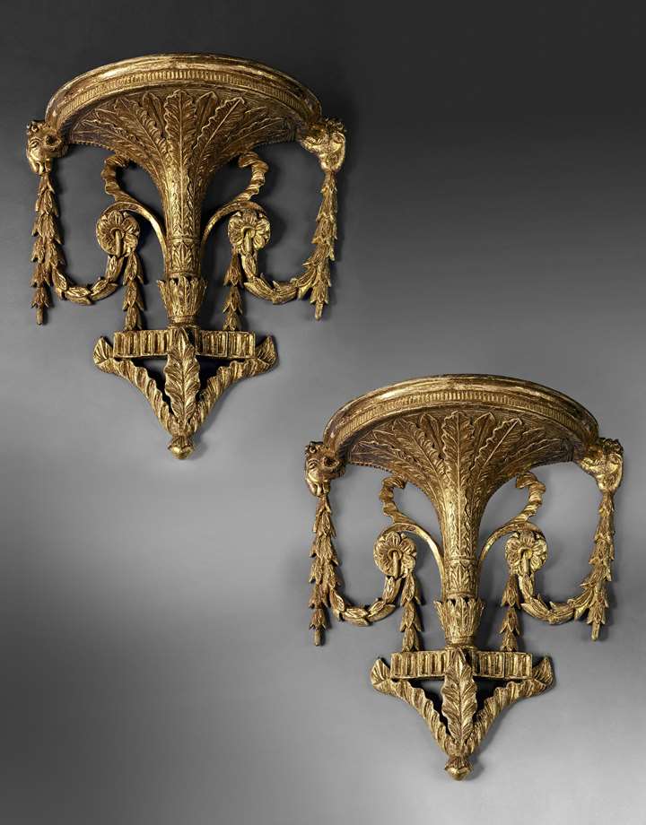 A PAIR OF GEORGE III GILTWOOD WALL BRACKETS