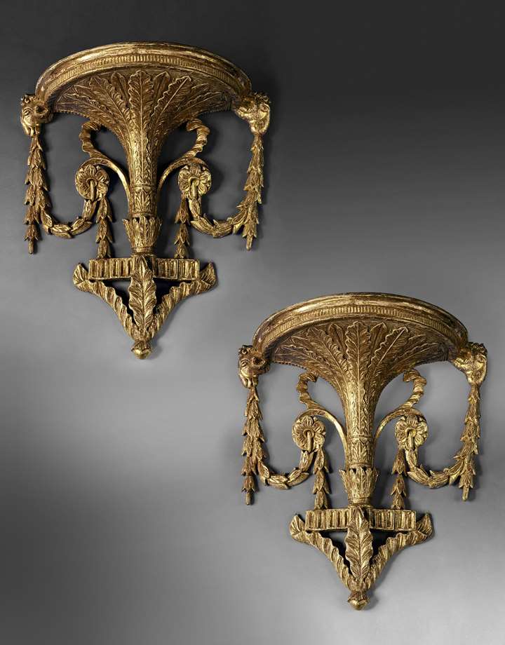 A PAIR OF GEORGE III GILTWOOD WALL BRACKETS