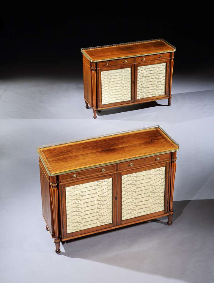 A PAIR OF GEORGE III BRASS MOUNTED ROSEWOOD SIDE CABINETS