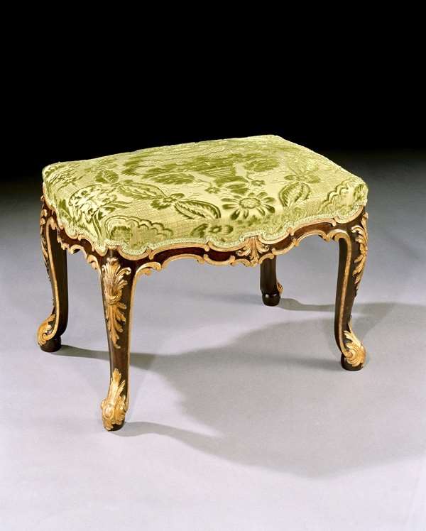 A GEORGE II PARCEL GILT MAHOGANY STOOL