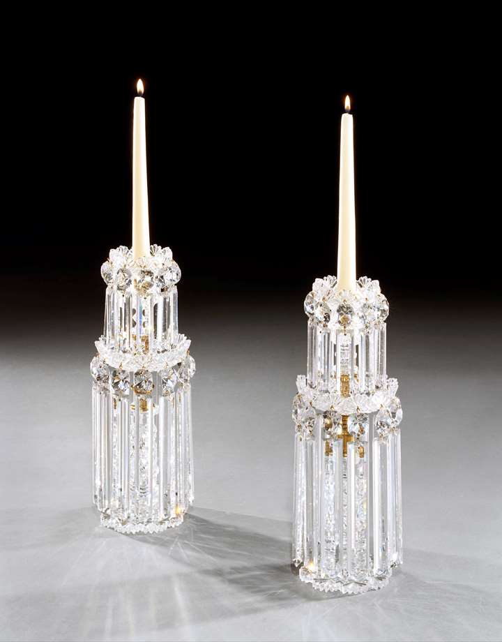 A PAIR OF WILLIAM IV CUT GLASS CANDLESTICKS