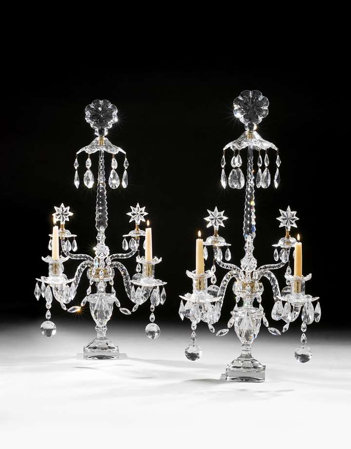 A pair of cut glass two light candelabra